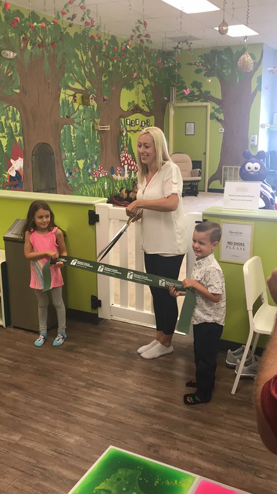 Ribbon cutting at Charming Star Playroom